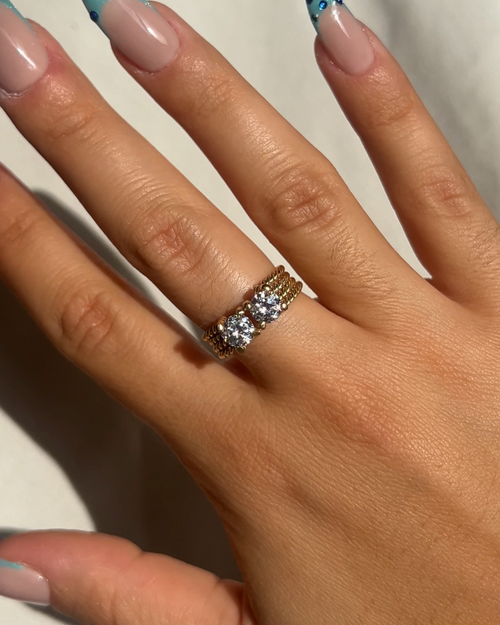 Anello Doppi Zirconi
